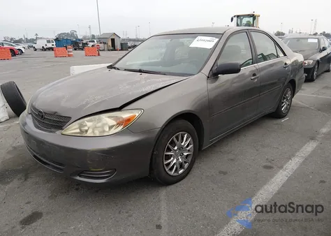 2002 Toyota Camry Le from USA, damaged, VIN JTDBE32K520097841